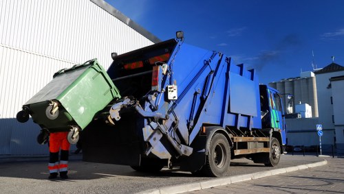 Commercial waste collection trucks in Seven Sisters